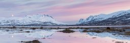 This photo was taken at 02:30 AM, just before sunrise in Tromsø, Arctic Norway. In only about a week the sun will be up all day, but until then we can enjoy some beautiful sunsets and sunrises. This is taken from Langnes (near the airport) looking in the direction of Ersfjorden.